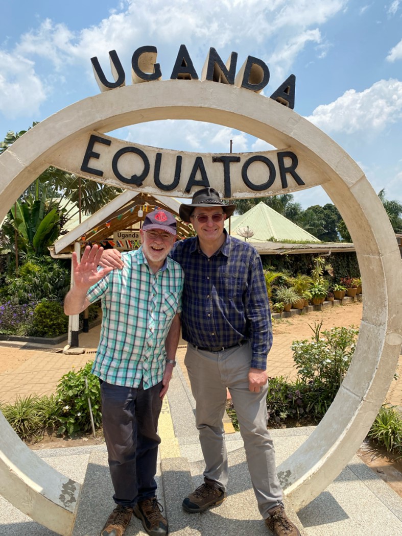 Jon and Stuart at the Ugandan Equator. Stuart is in one equator and Jon in the other